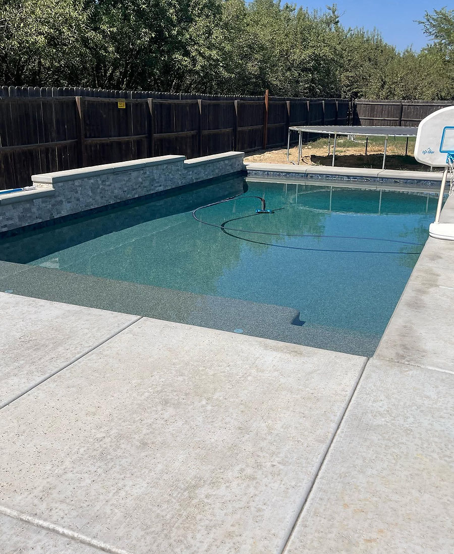 California backyard transformation with a custom swimming pool.