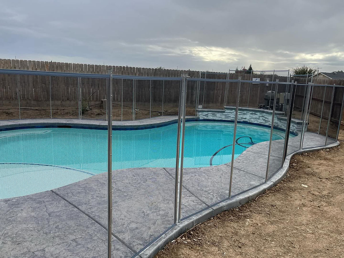 Backyard swimming pool being checked for water loss during a California pool leak repair